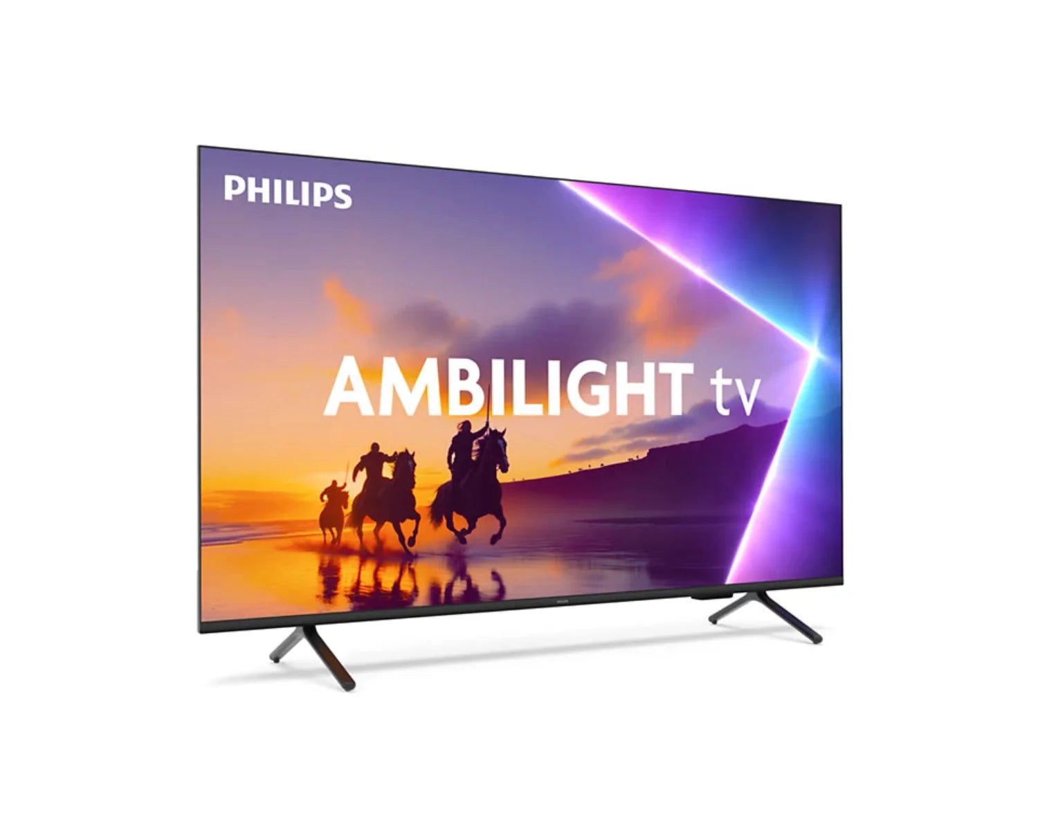Telewizor Philips Ambilight wyświetla scenę trzech osób na koniach na plaży o zachodzie słońca.