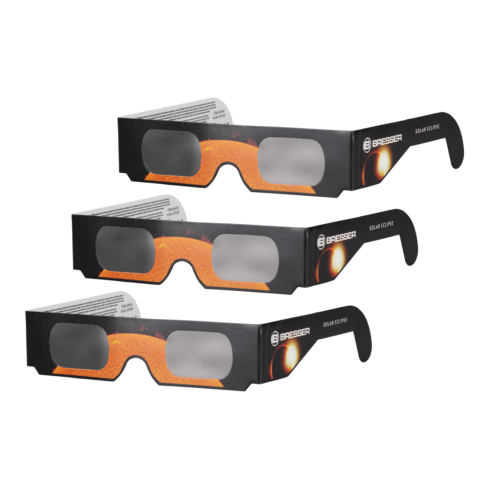 Tres pares de gafas de eclipse solar negras con motivo de sol, una al lado de otra.