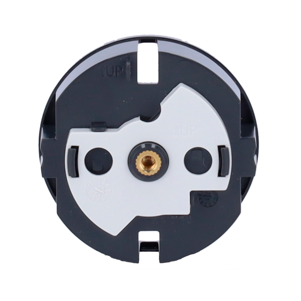 Retro di un componente nero rotondo con meccanismo interno bianco e vite in ottone.