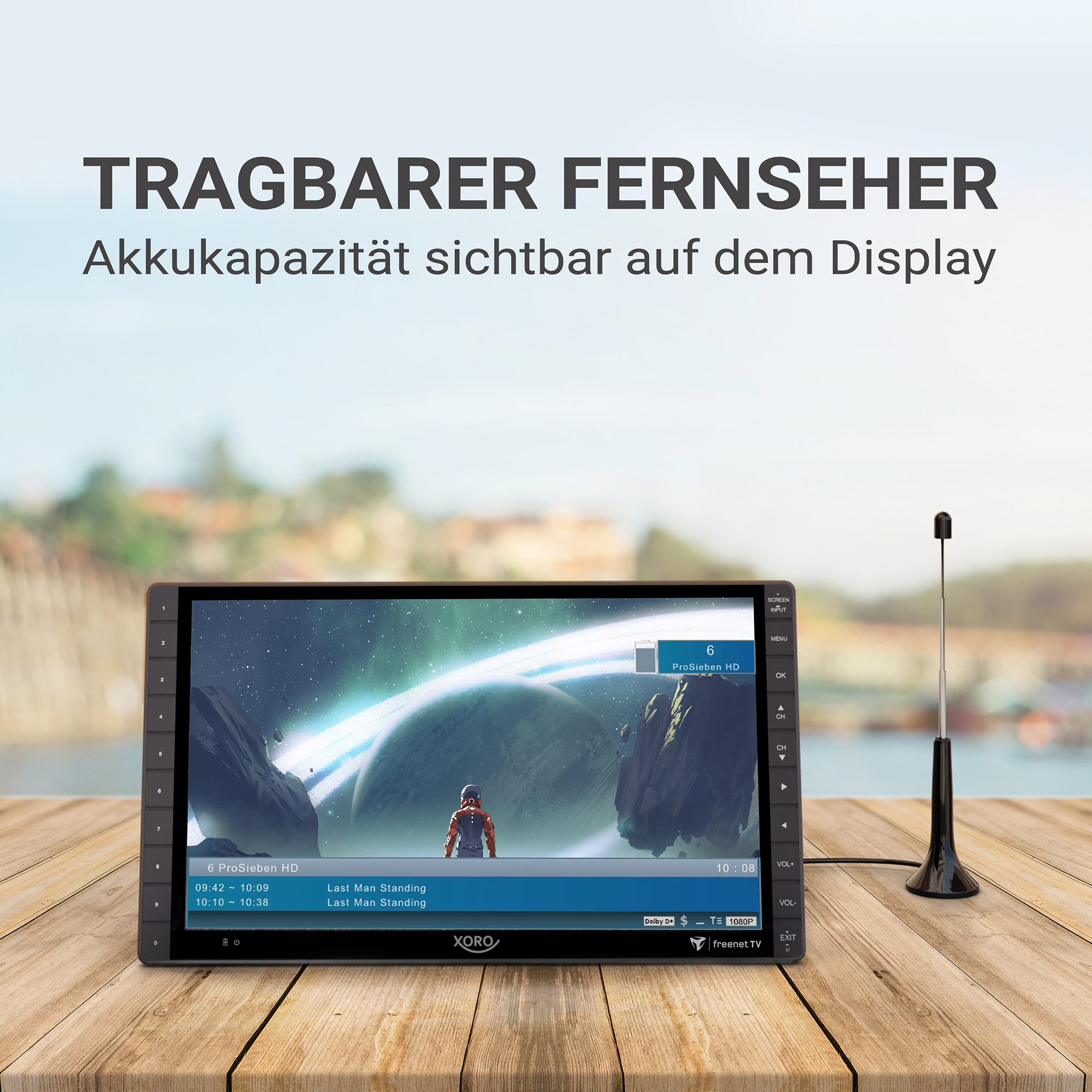 Tragbarer Fernseher mit Weltraum-Szene, Akku-Anzeige und Antenne.