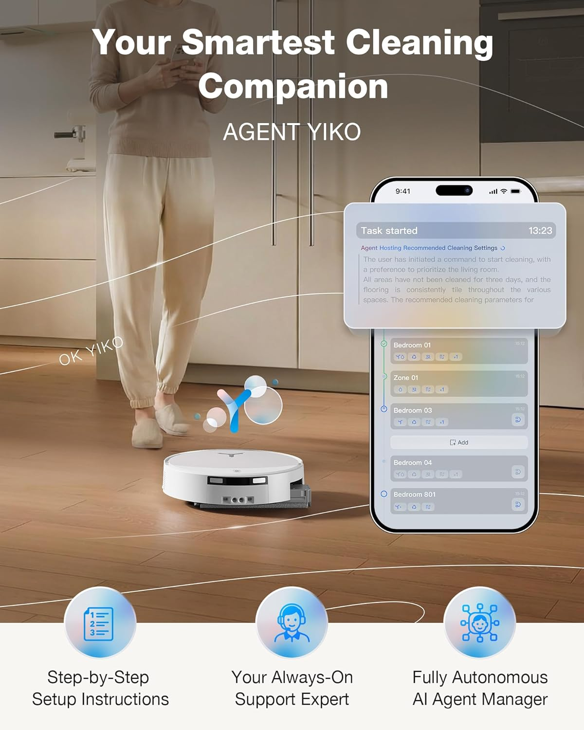 Un robot aspirateur blanc nettoie un parquet, à côté un smartphone affiche un plan de nettoyage.