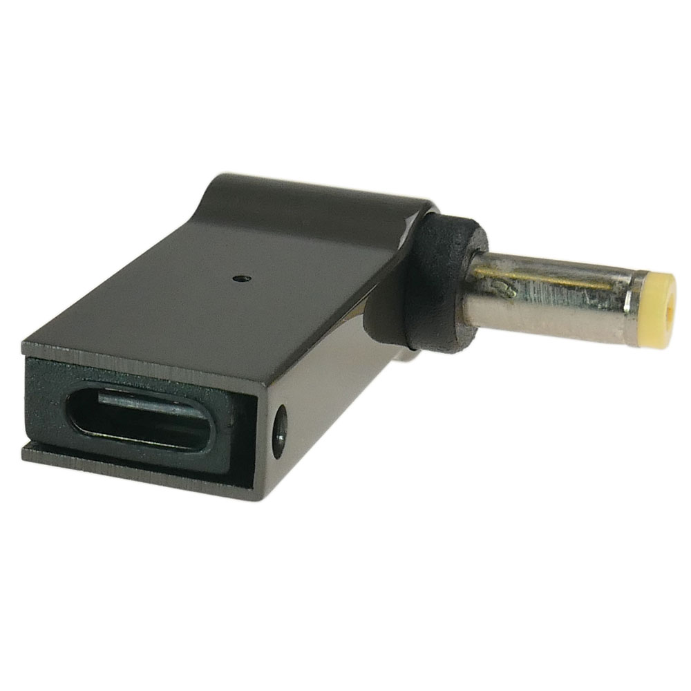 Czarny adapter USB-C z okrągłą metalową wtyczką i żółtą końcówką.