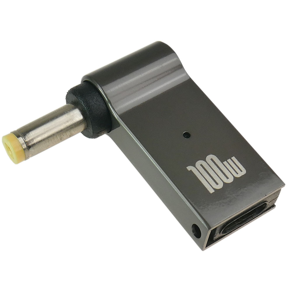 Szary adapter kątowy z logo 100W, portem USB-C i złączem beczkowym.