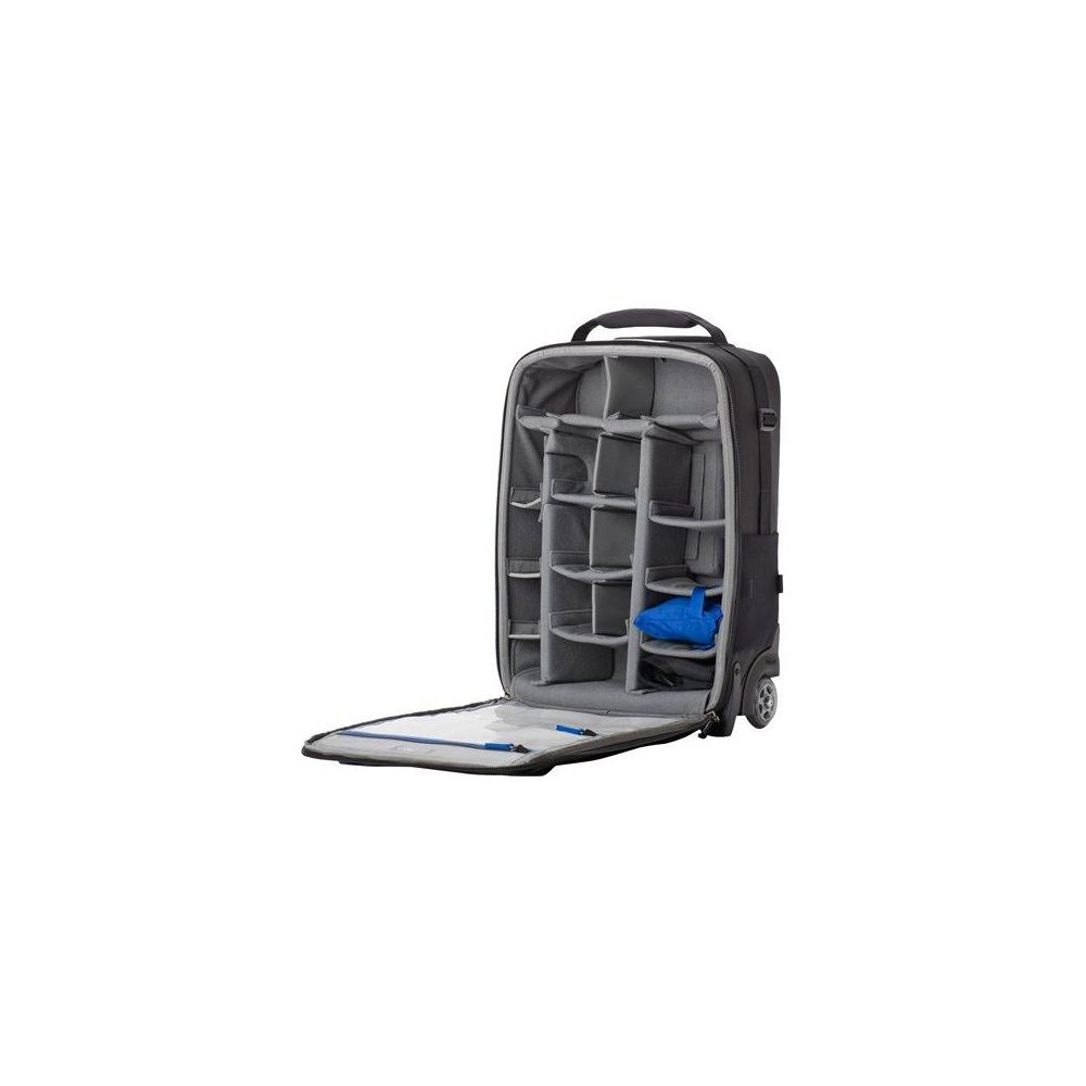 An open gray rolling suitcase with many compartments and a blue item.