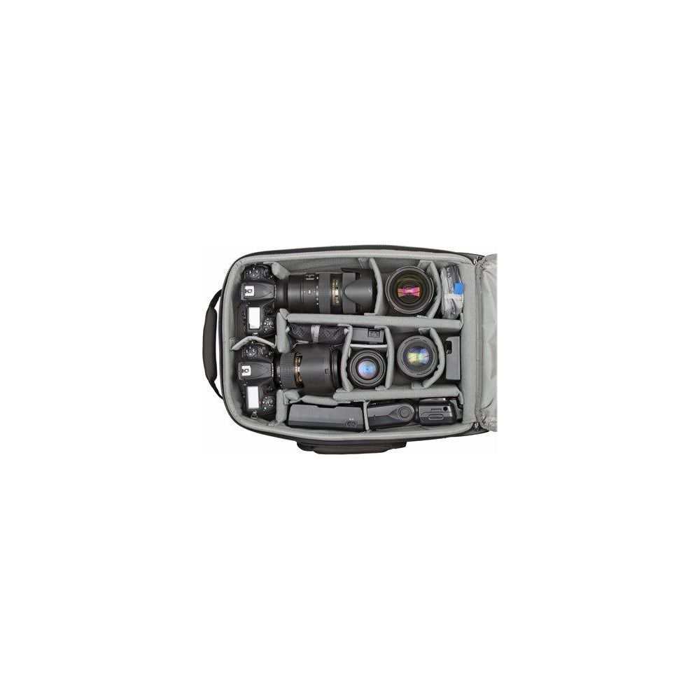 Gray camera bag with multiple lenses and cameras, organized in compartments.