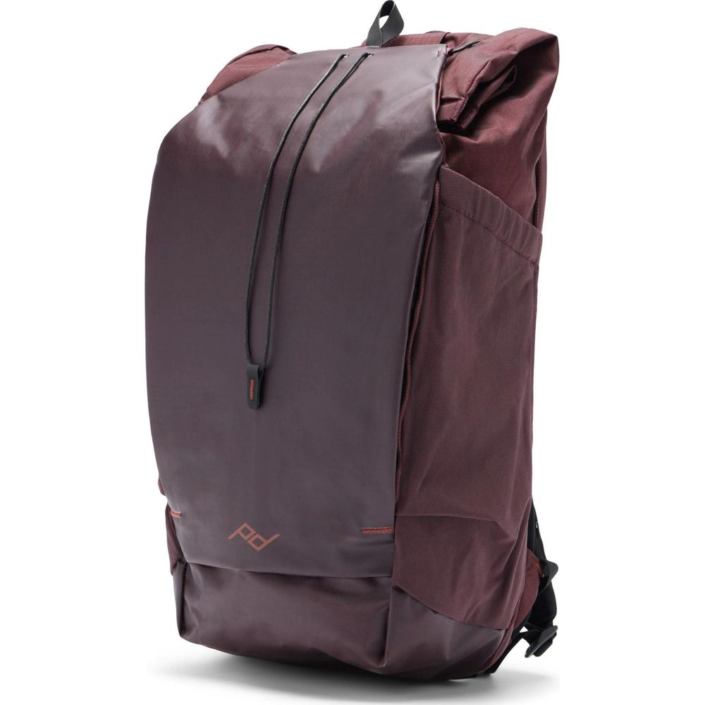 A burgundy backpack featuring a drawstring closure and two side pockets.