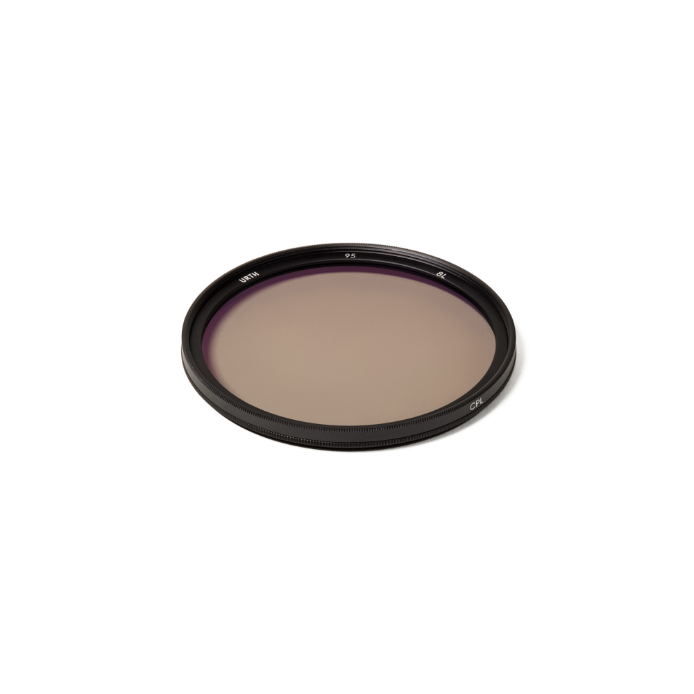 A round camera lens filter with a brown tint and black frame, labeled 'URTH 95 BL CPL'.