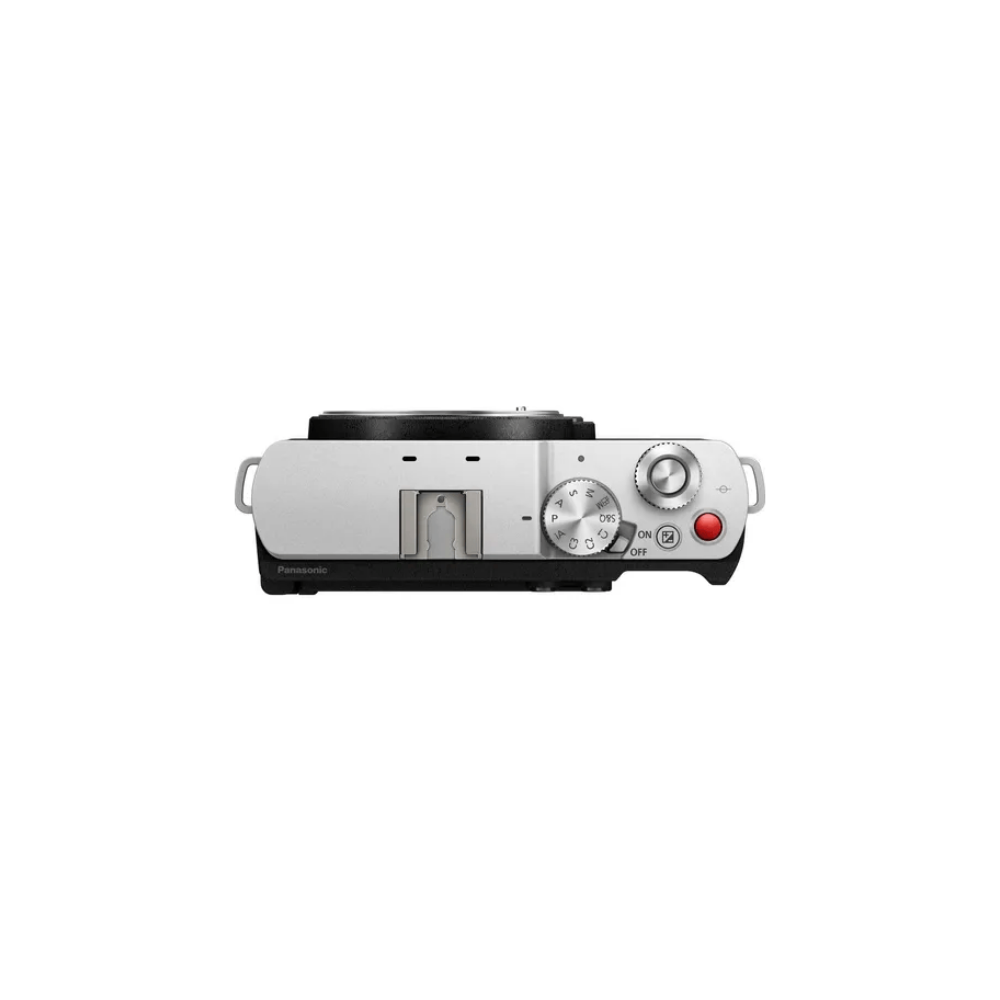Top view of a silver Panasonic camera with a mode dial, shutter button, and on/off switch.