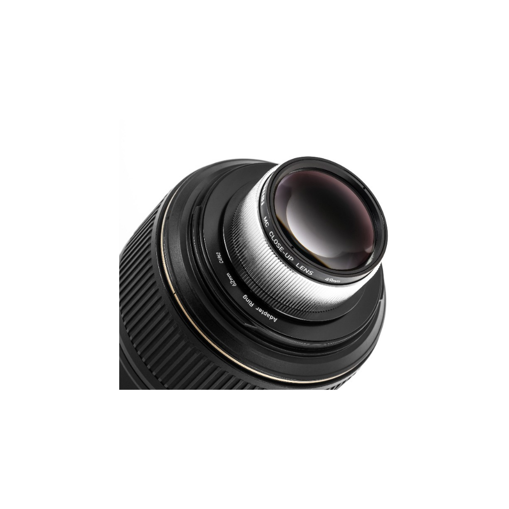 A macro lens with a close-up filter and adapter ring, on a white background.