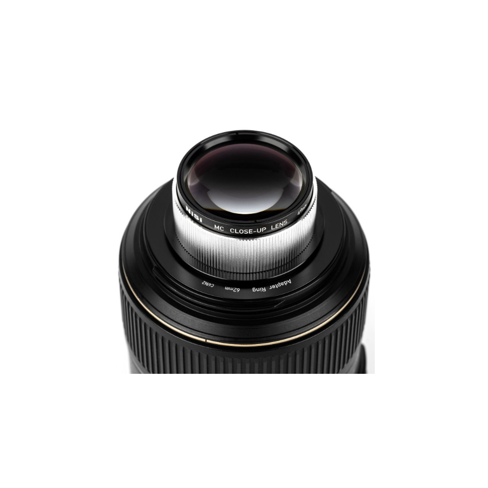 A Nisi MC Close-Up Lens with adapter ring and 62mm thread.