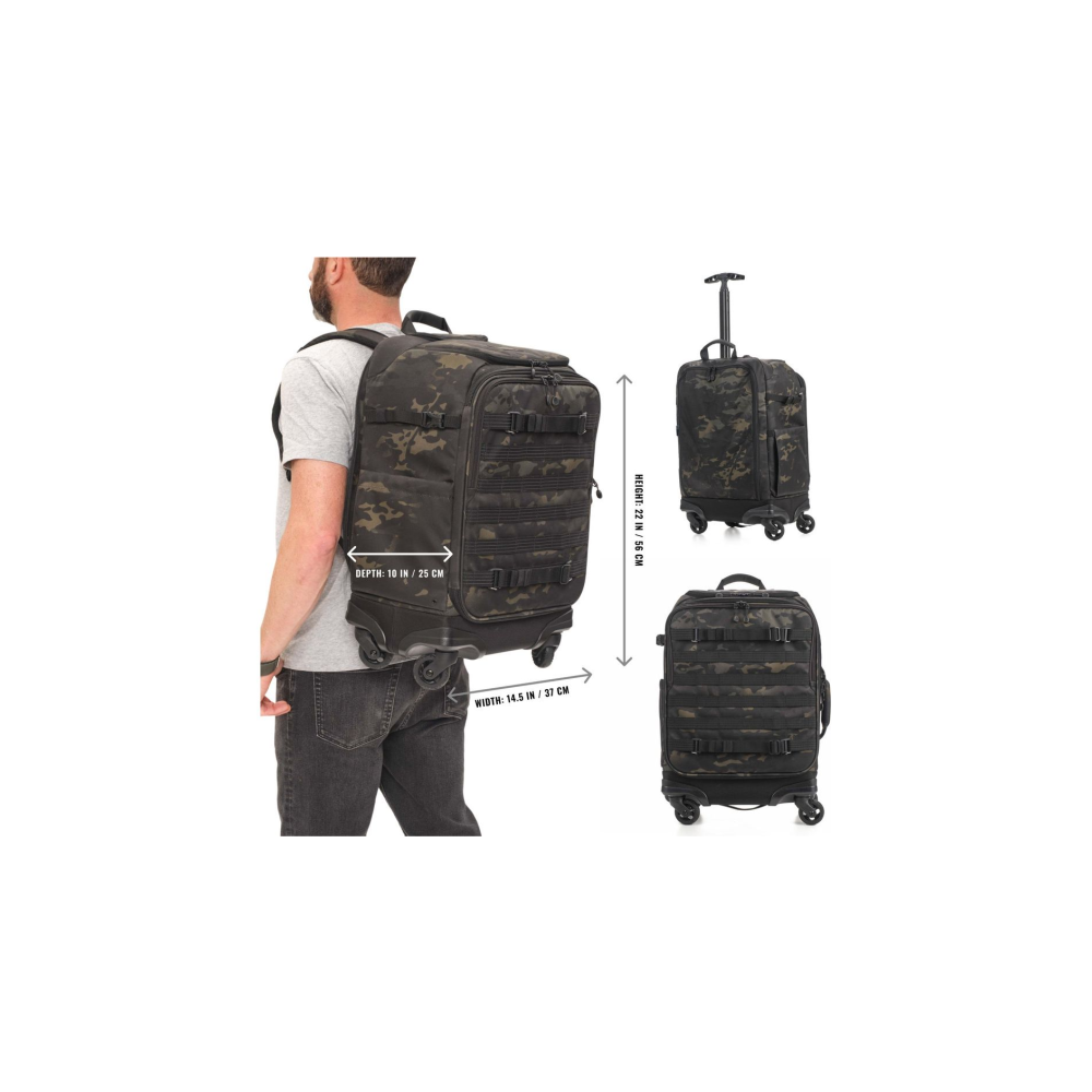 A man wears a camouflage backpack. Two suitcases are next to him.