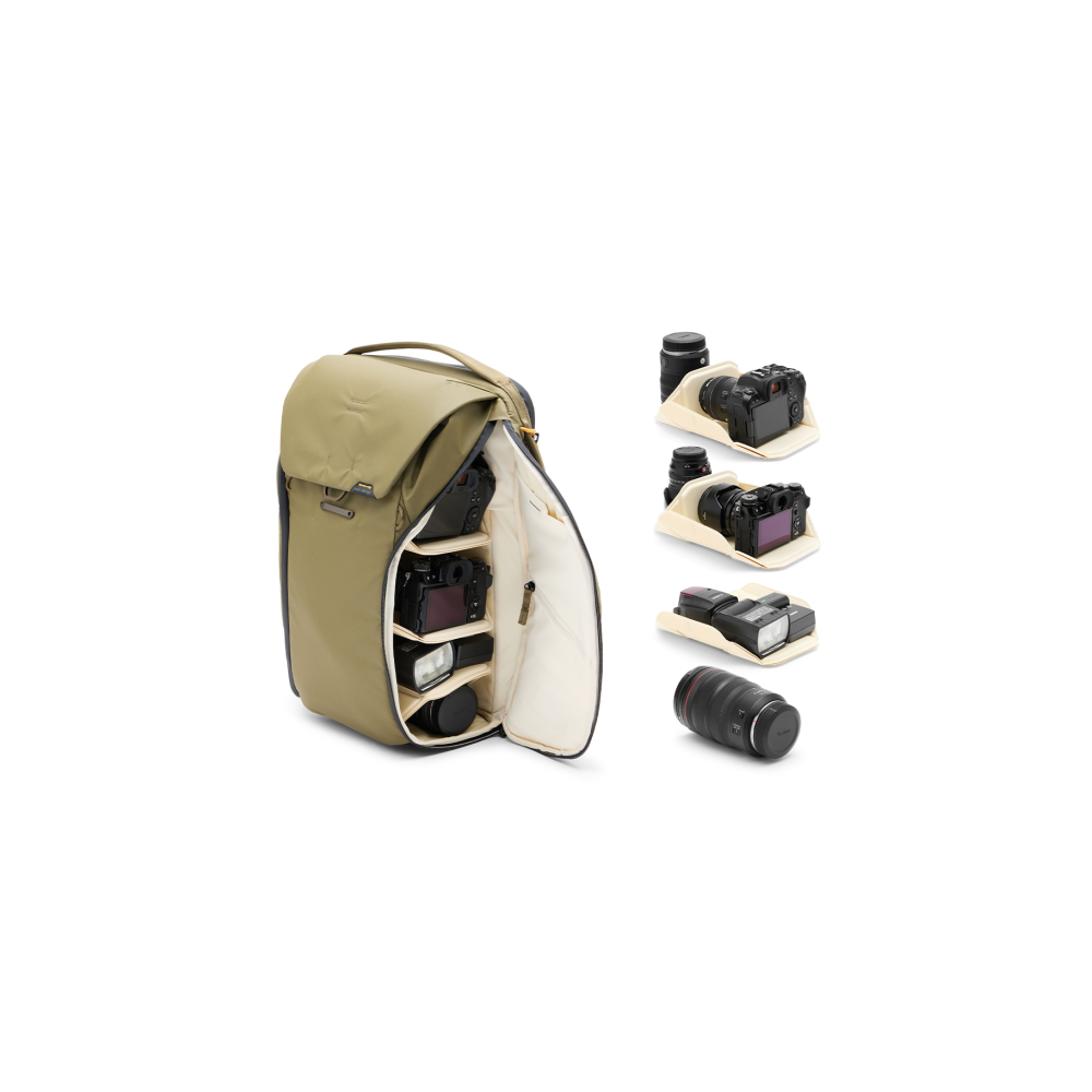 A khaki bag with cameras and lenses arranged inside and beside it.