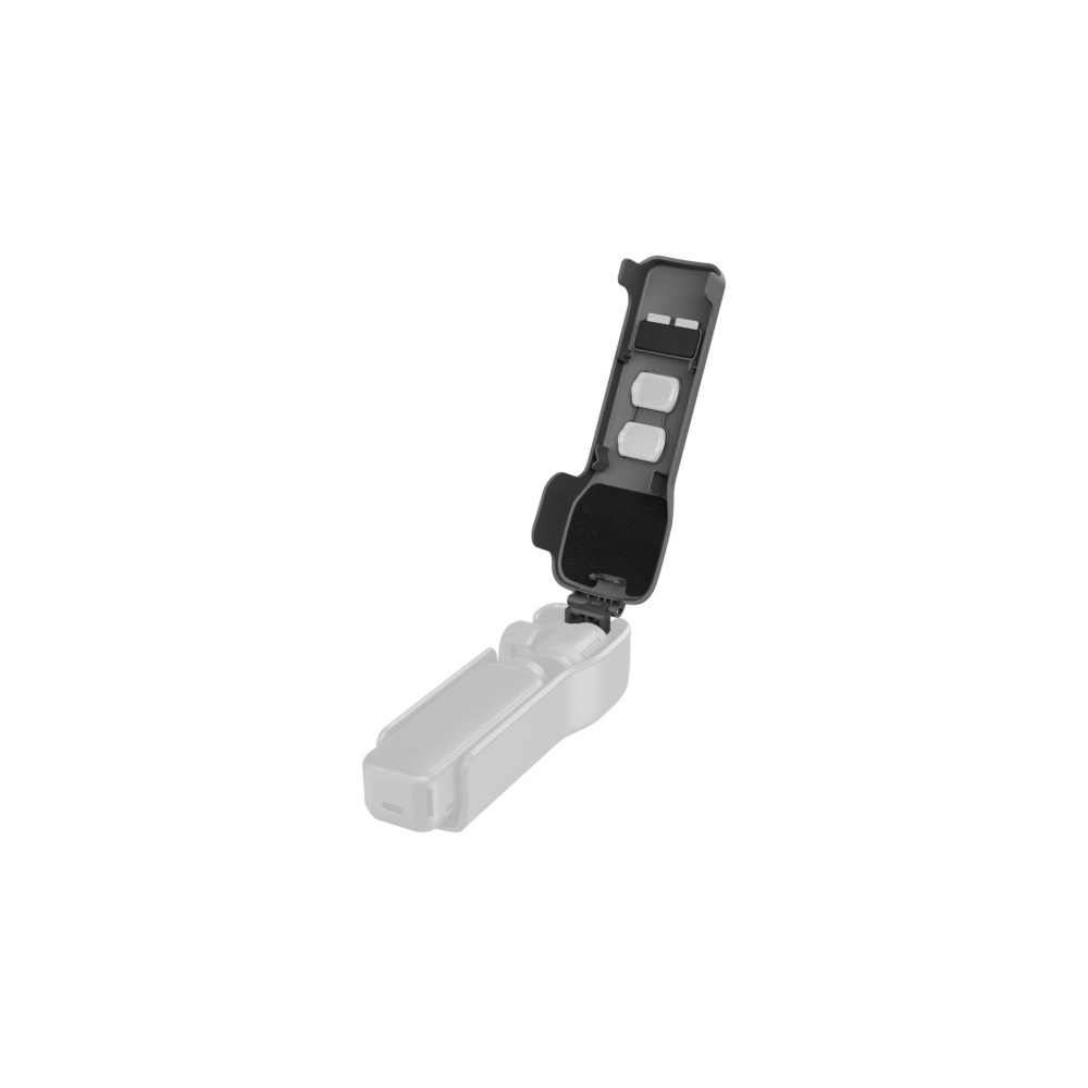 A grey attachment with two white buttons and foam on a light grey device.