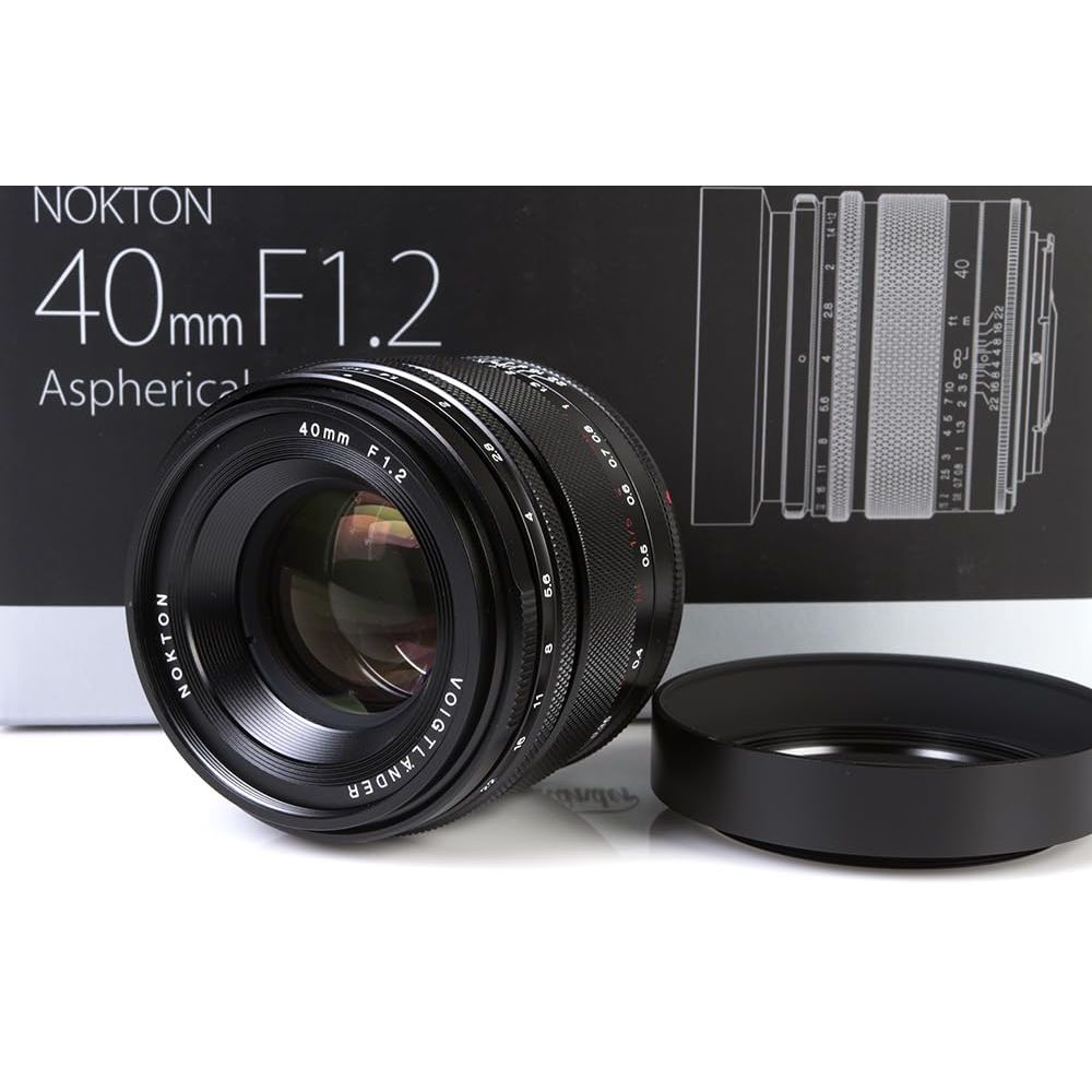 A black Nokton 40mm F1.2 lens with lens hood and packaging.