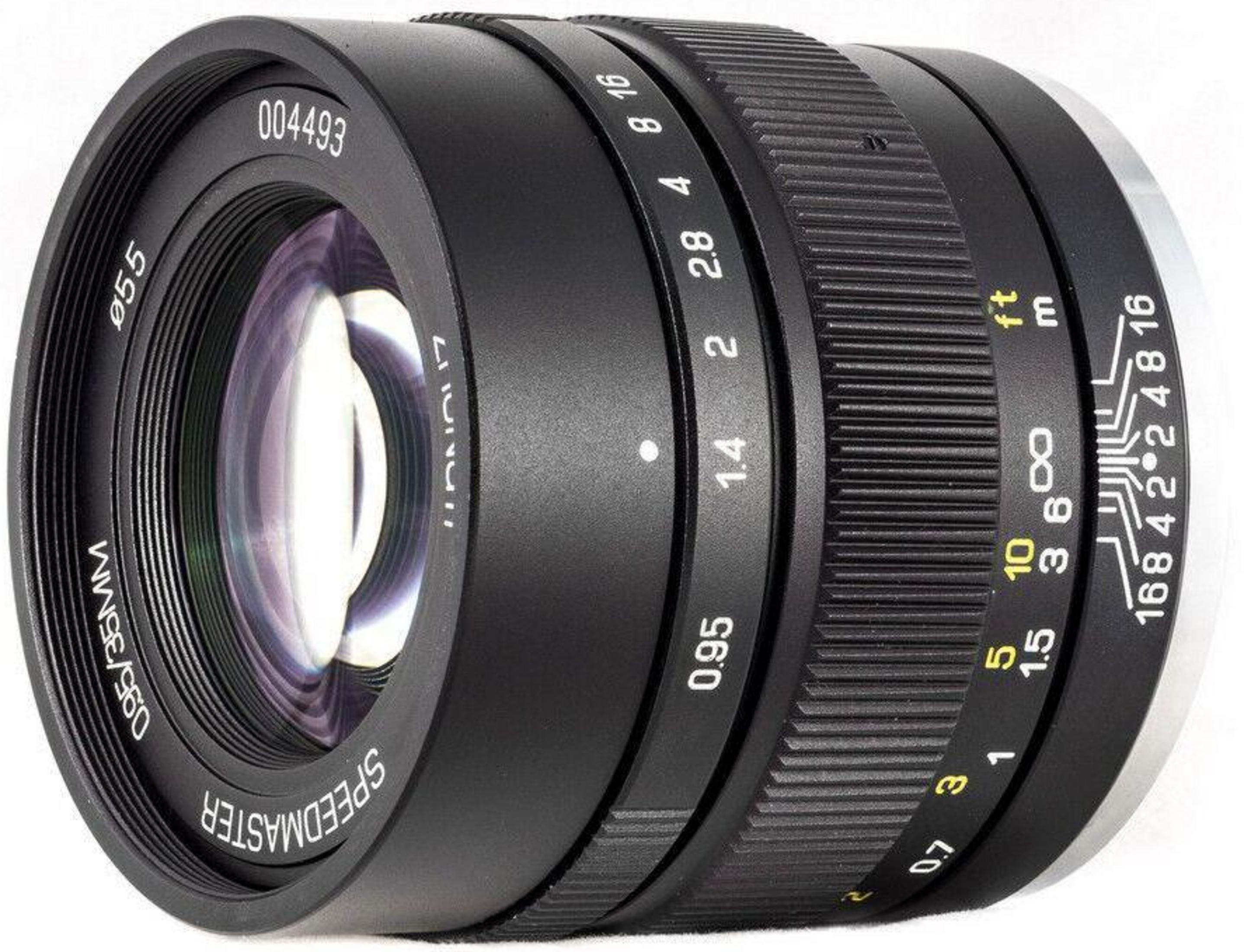 Black camera lens with aperture and focus scales. Serial number 004493.