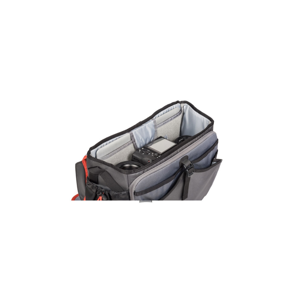 Gray camera bag with a black camera and lenses inside.