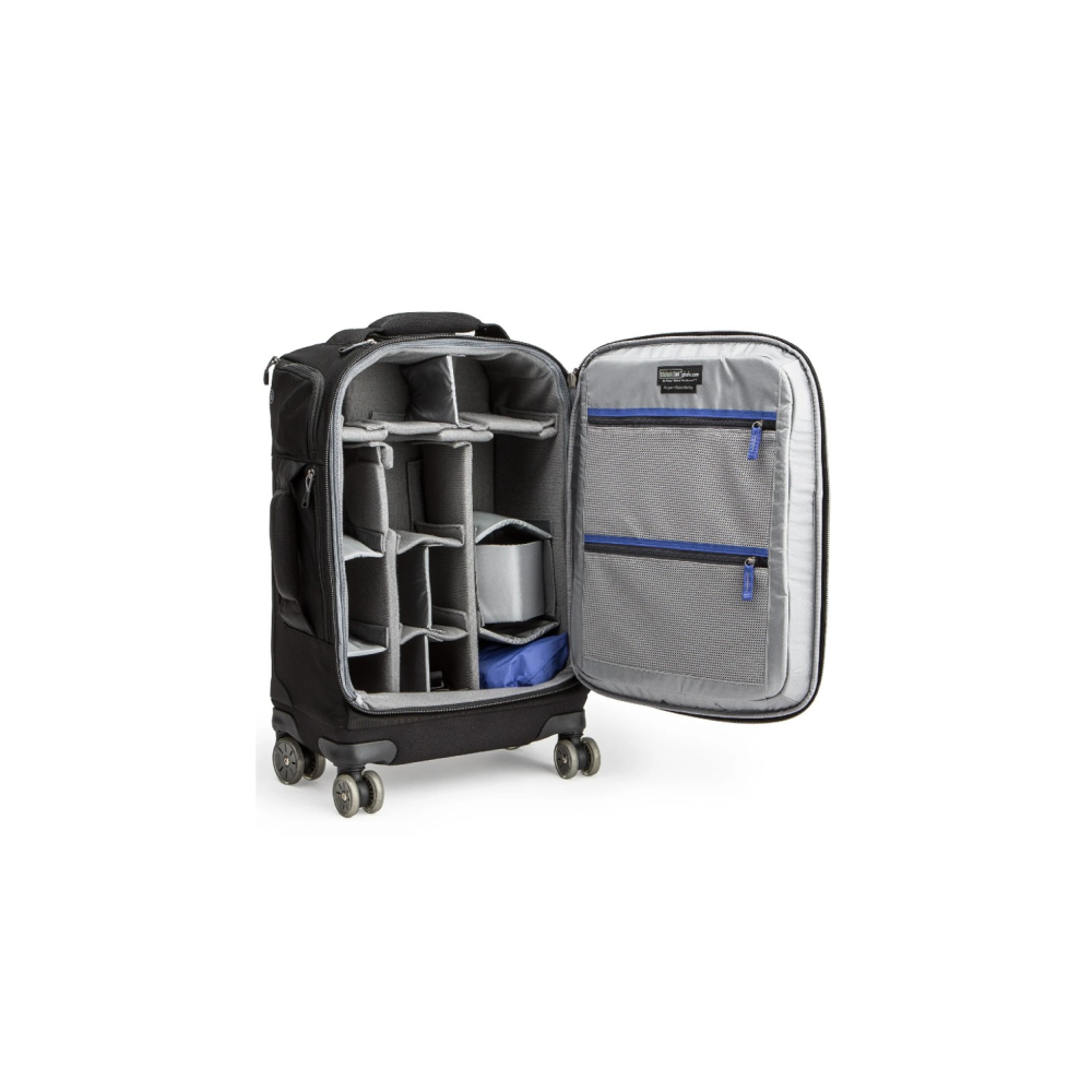 An open black rolling suitcase with dividers and mesh pockets.