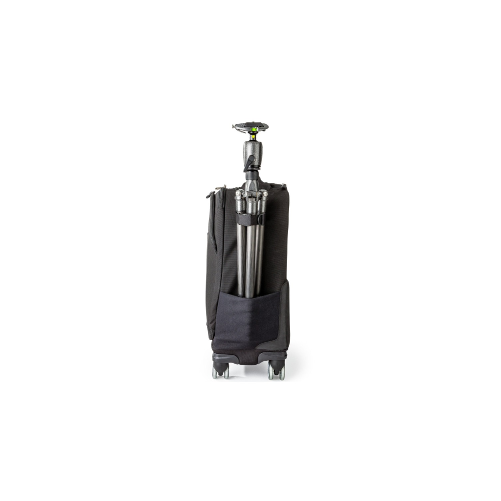 A black rolling suitcase with a tripod secured in a side pocket.