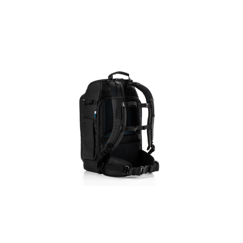 Black backpack with padded straps and hip belt, viewed from the back.