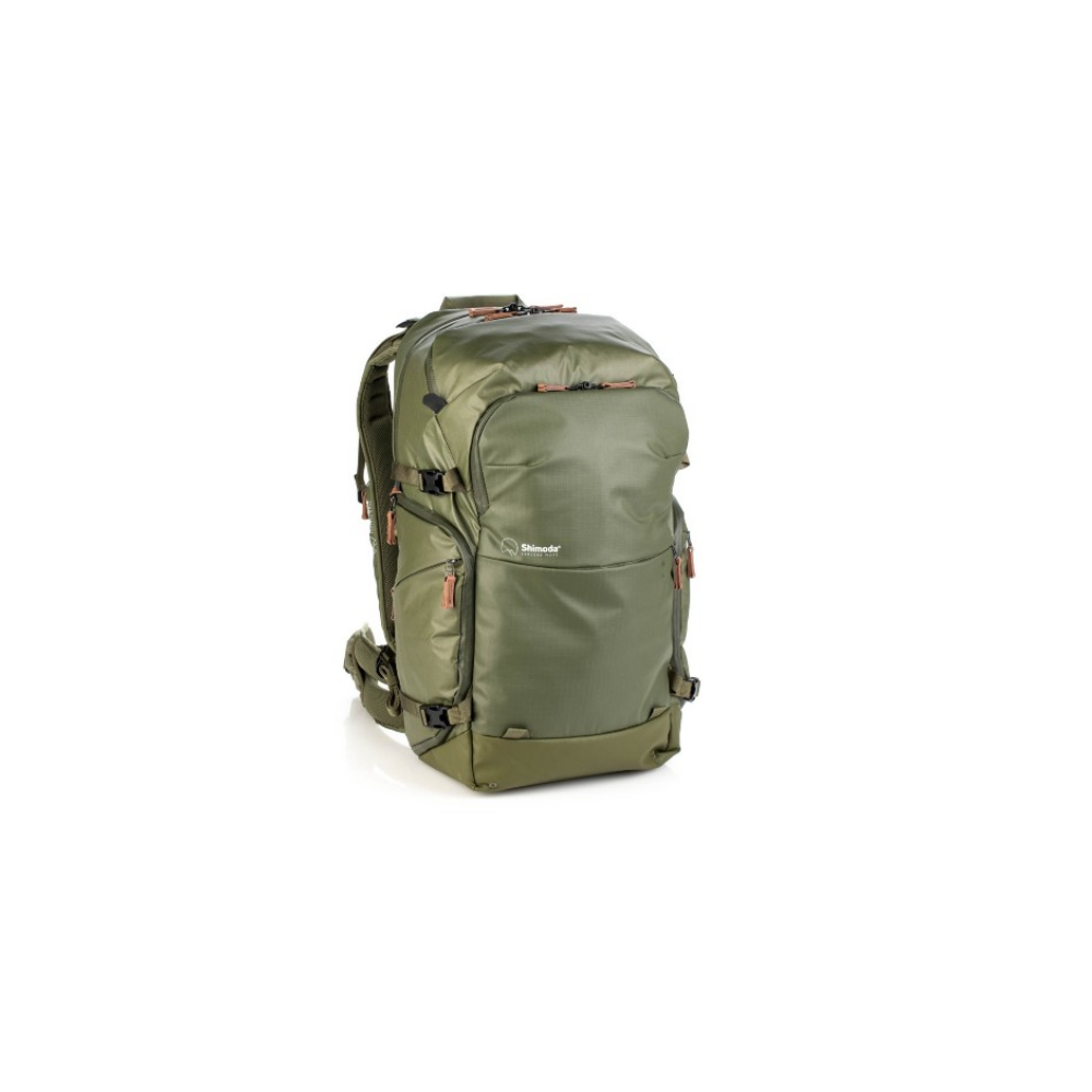 An olive green backpack with orange accents stands against a white background.
