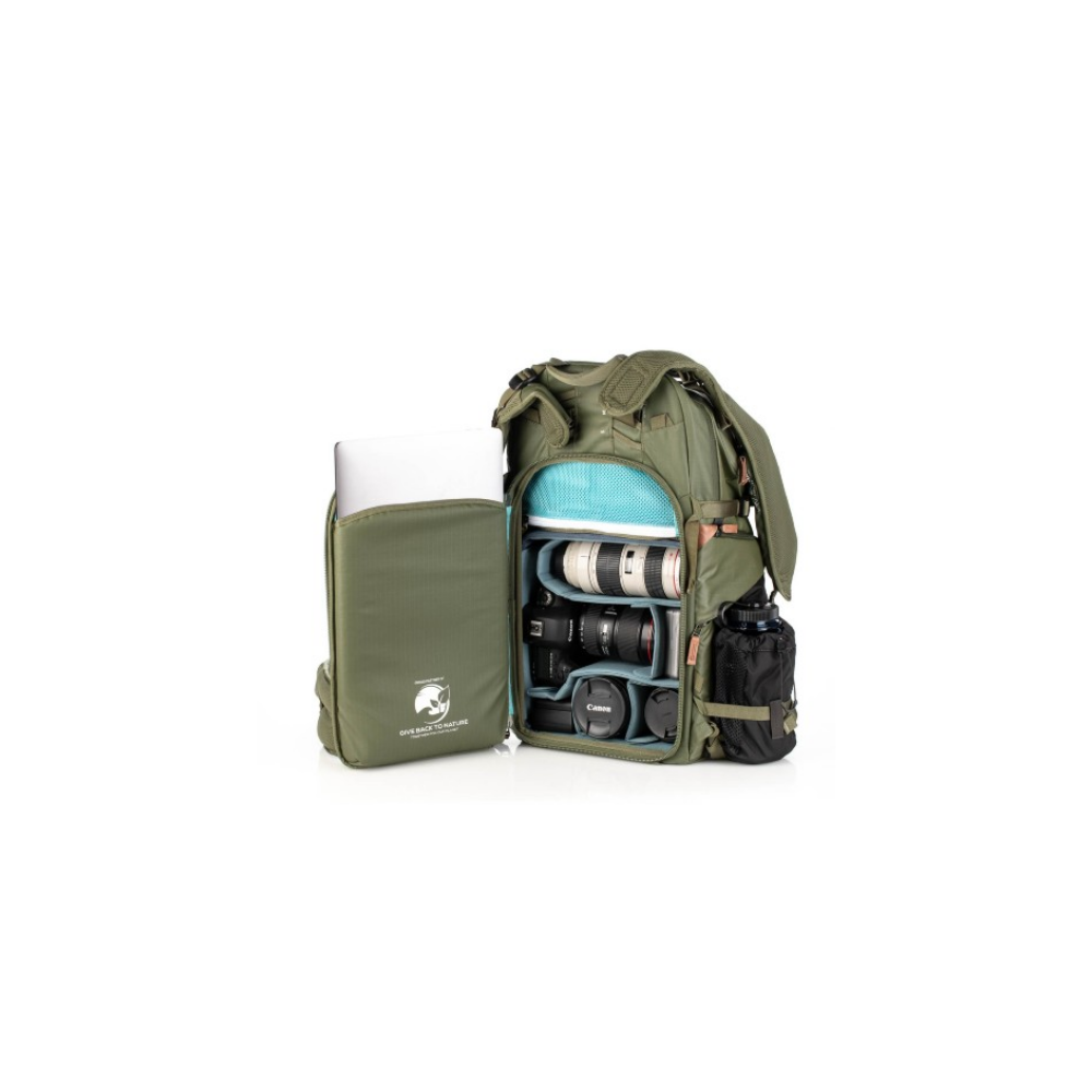 Green camera backpack with open laptop compartment and lenses inside.