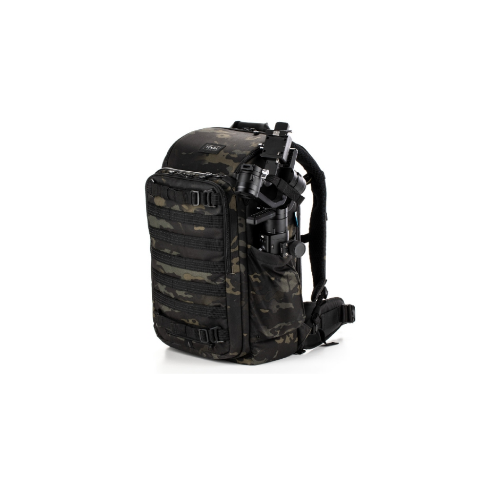A camouflage backpack with a gimbal and tripod, isolated on a white background.