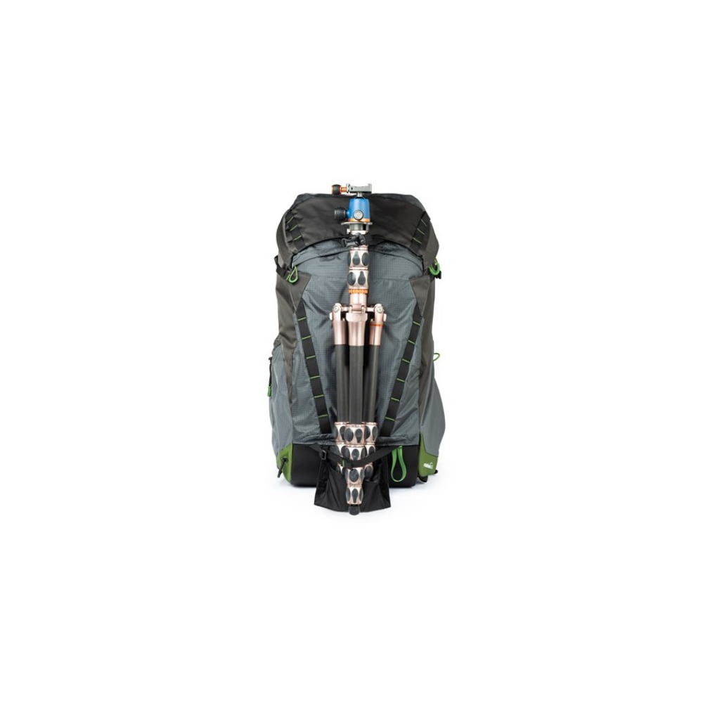 A gray and black backpack with a tripod attached to the front. Green accents.