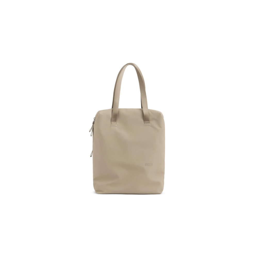 Een beige tote tas met twee hengsels en ritssluiting.