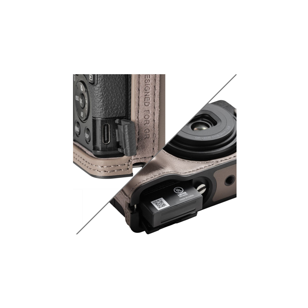 A camera with a leather case, showing a USB port and a battery pack.
