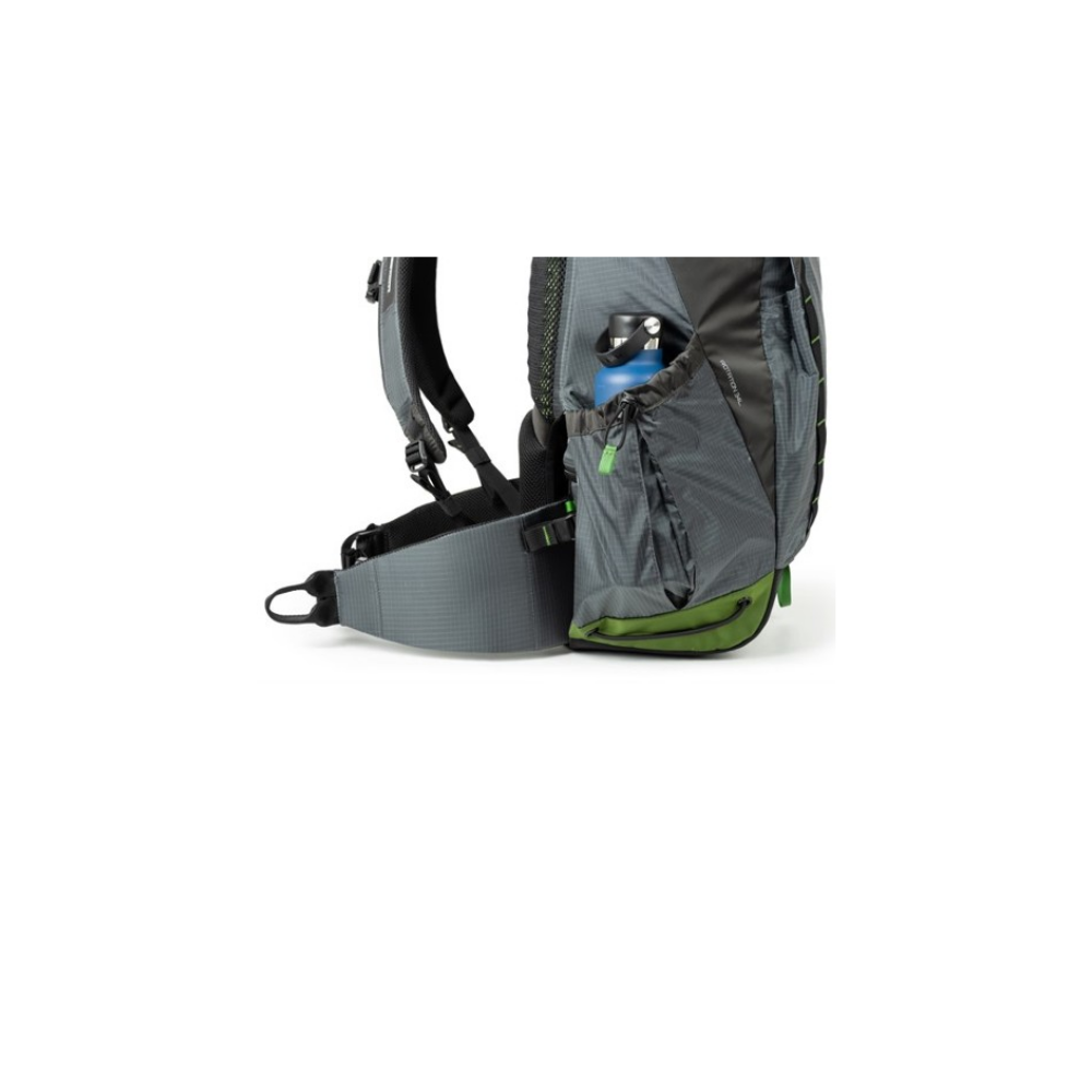 Gray backpack with green accents and a blue water bottle.