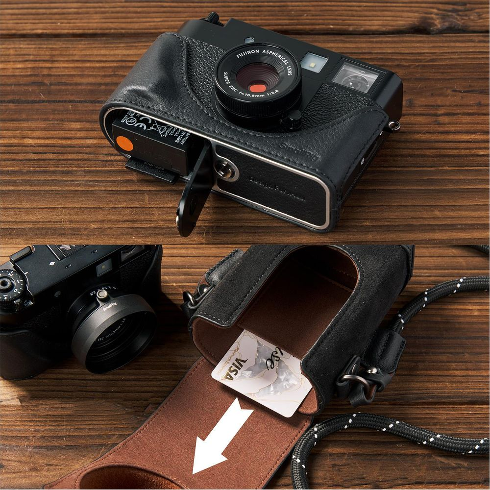 Een zwarte leren camerahoes met een kaartsleuf waarin een VISA-kaart wordt getoond.