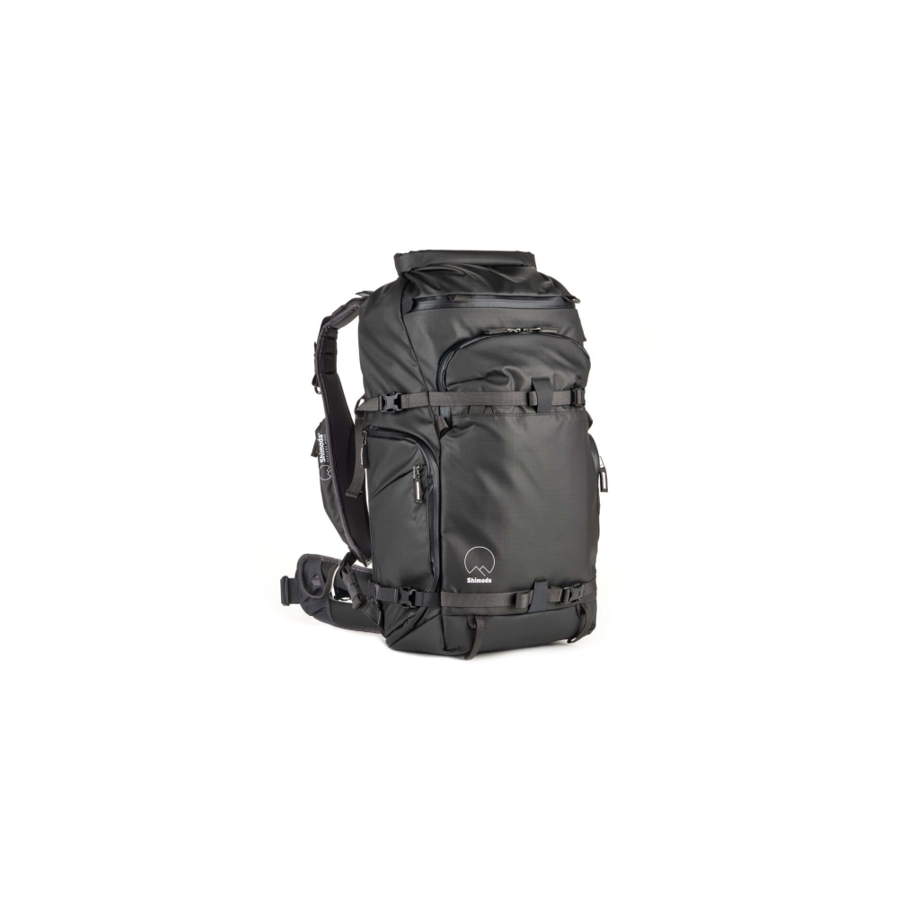 A black backpack with multiple pockets and straps, on a white background.