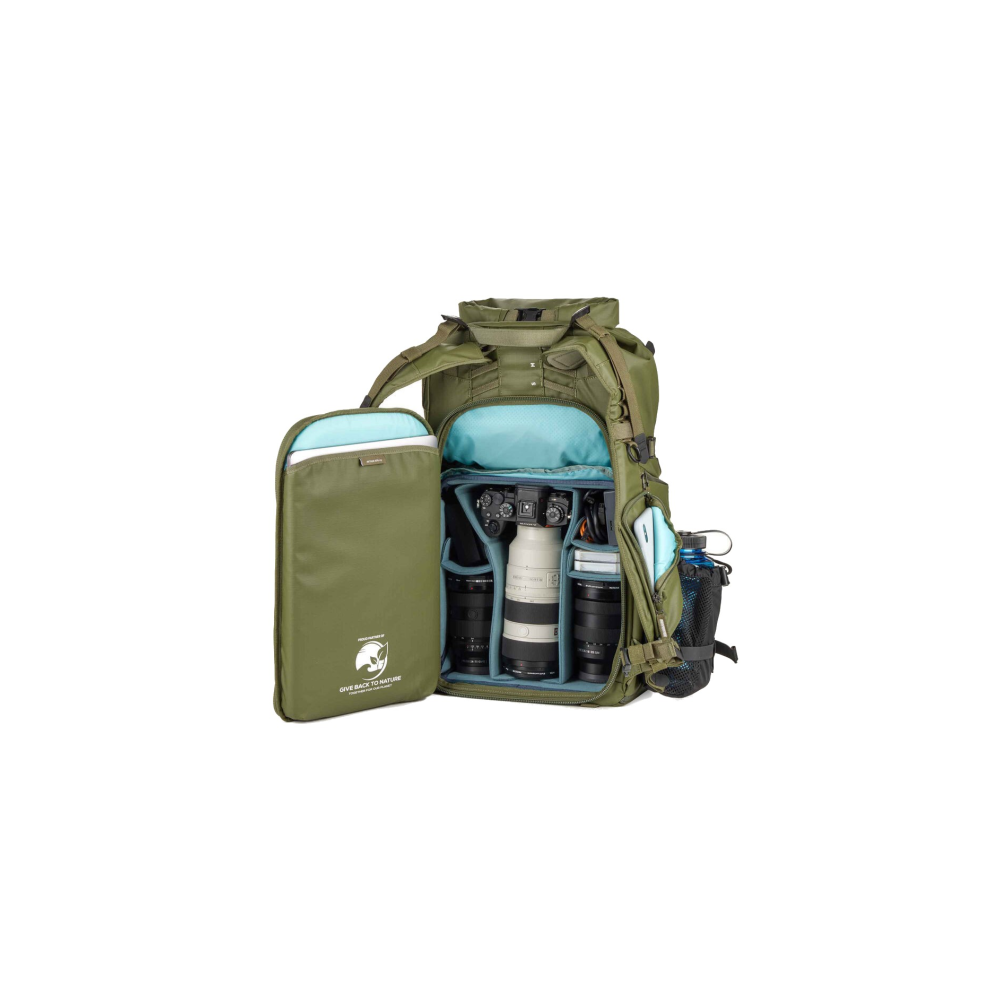 An open olive green backpack with cameras and lenses inside.