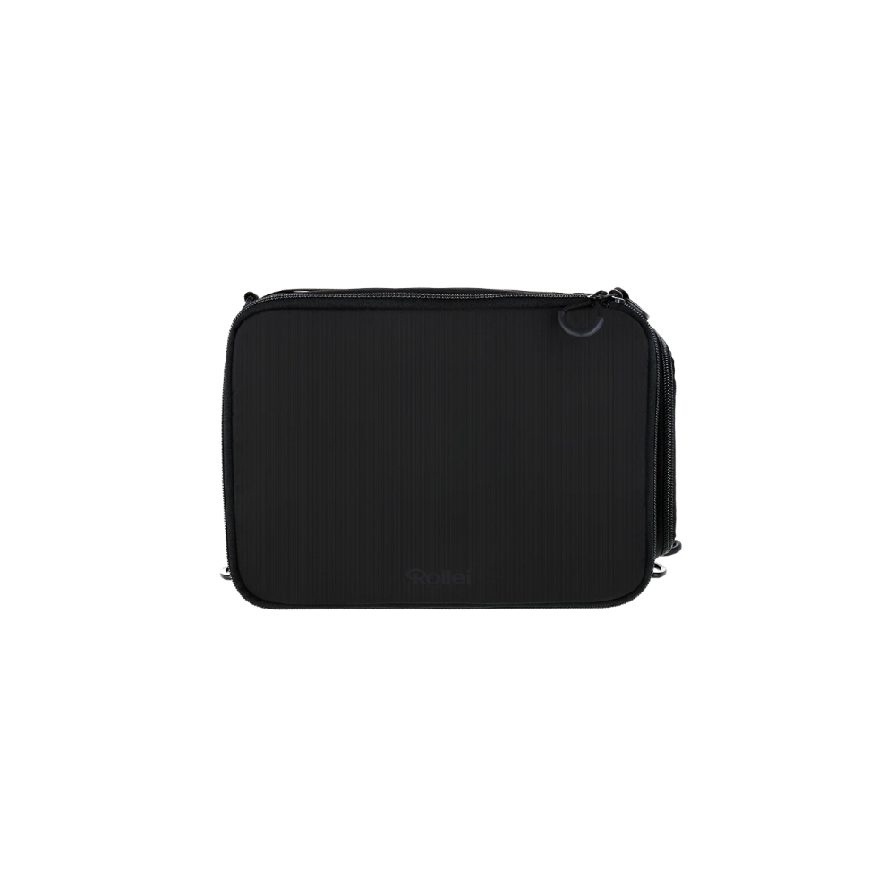 Black Rollei bag with zipper and straps, vertical ribbed texture.