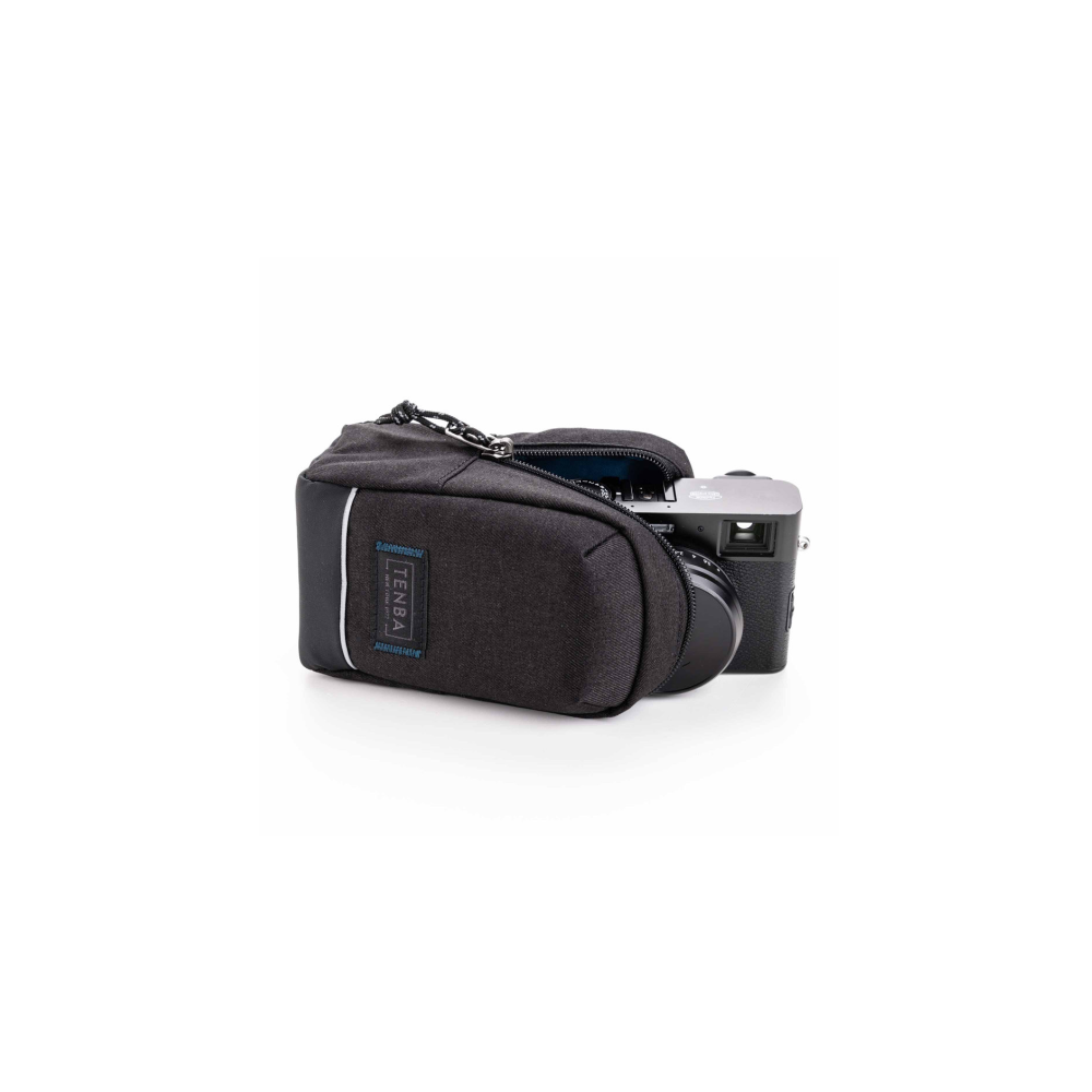 A dark camera bag with a silver camera lens setup.
