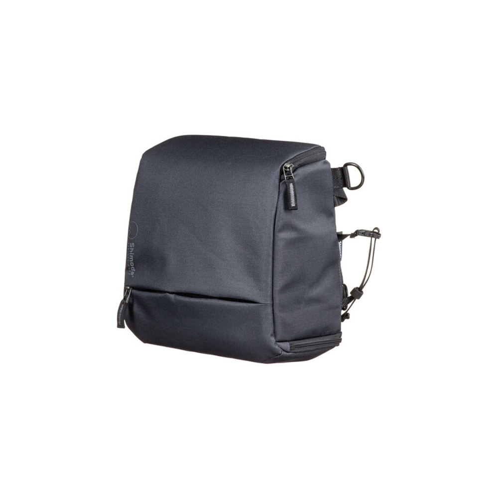 A dark gray camera bag with zippers and a D-ring.