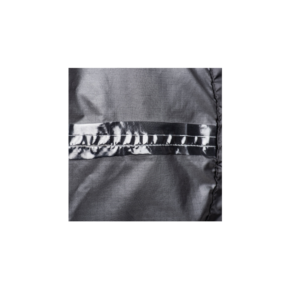 Close-up of a dark, shiny fabric surface with reflective stripes.