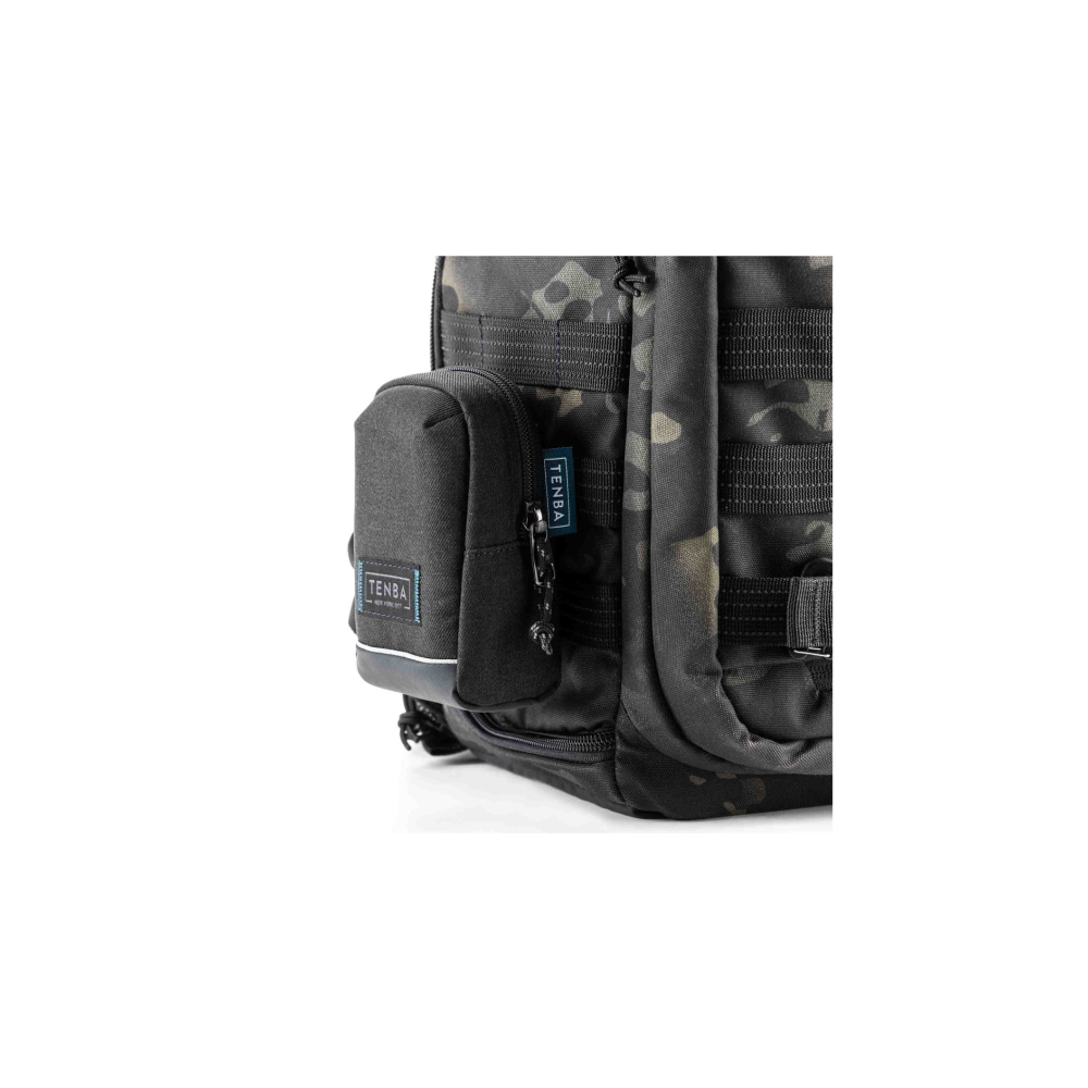 A black backpack with a camouflage pattern and a small attached pouch. Features 'TENBA' branding.