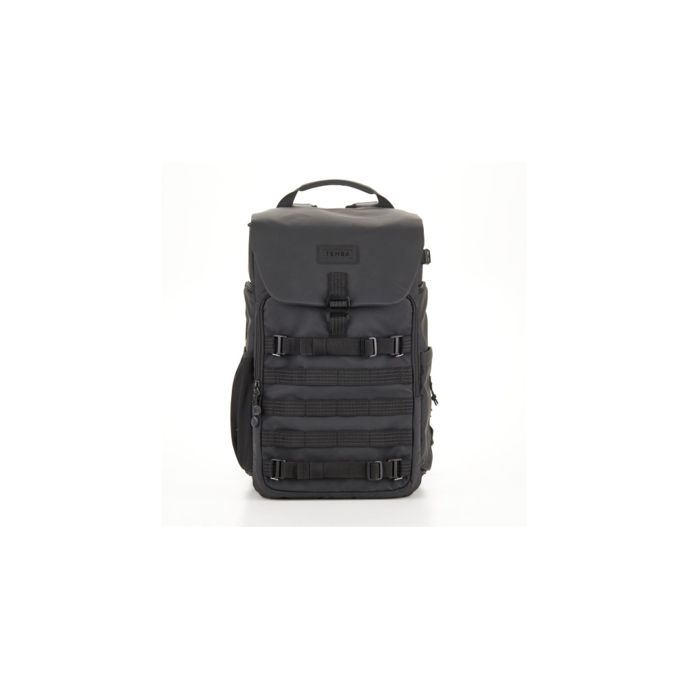 A black Tenba backpack with buckles and straps on a white background.