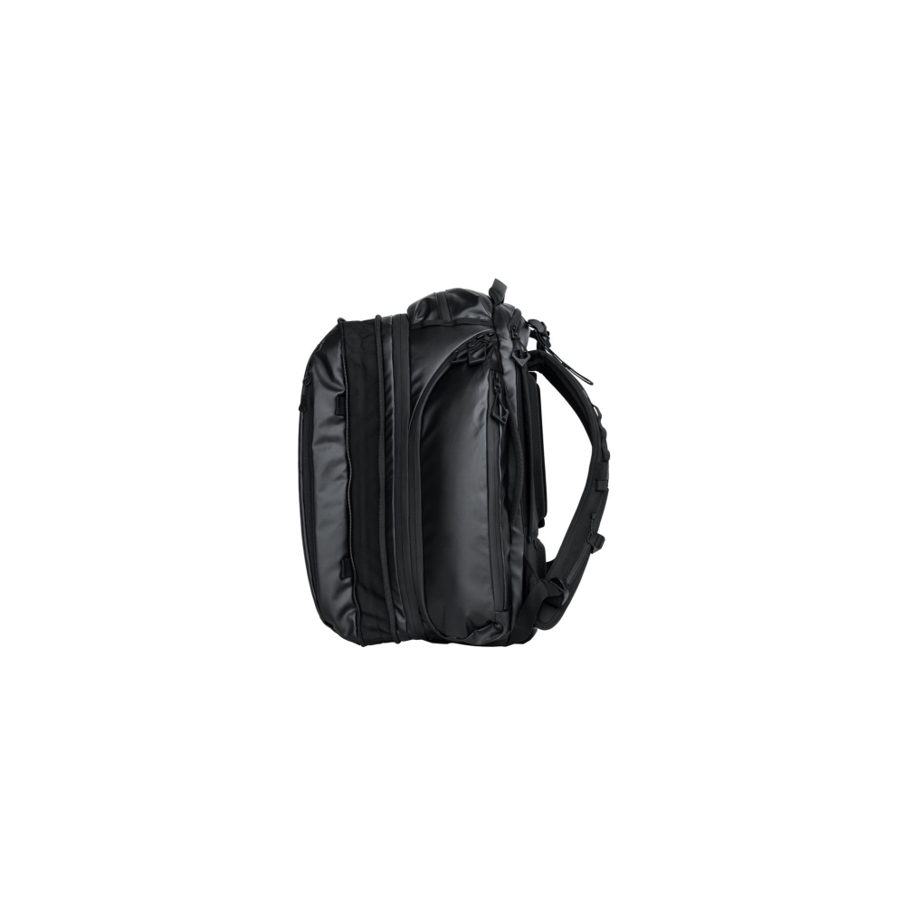 Black backpack with multiple compartments, viewed from the side.