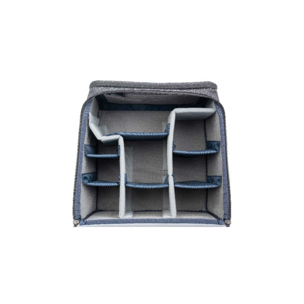 A gray fabric camera bag insert with blue trim and adjustable dividers.