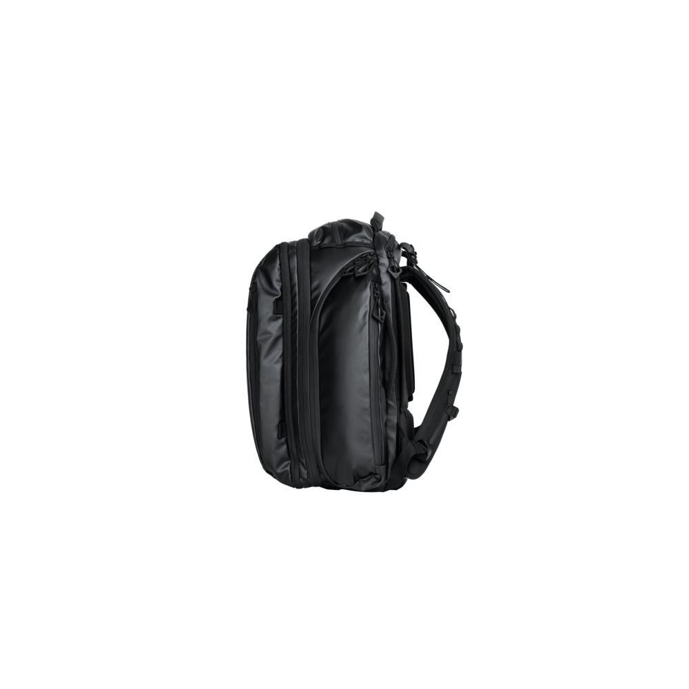 Black backpack with zippers and straps, shown from the side.