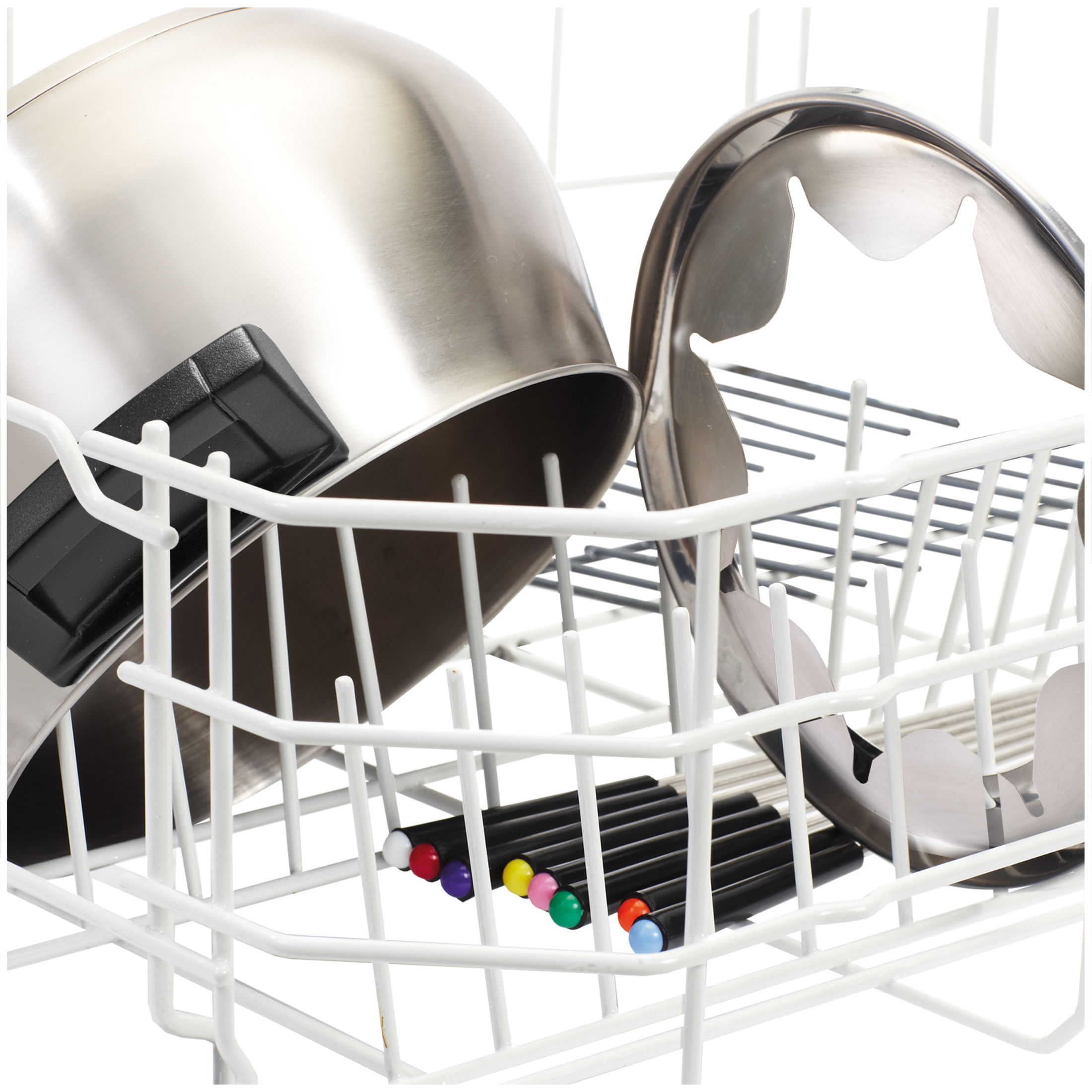 A metal pot and tongs in a white dish rack next to colorful markers.