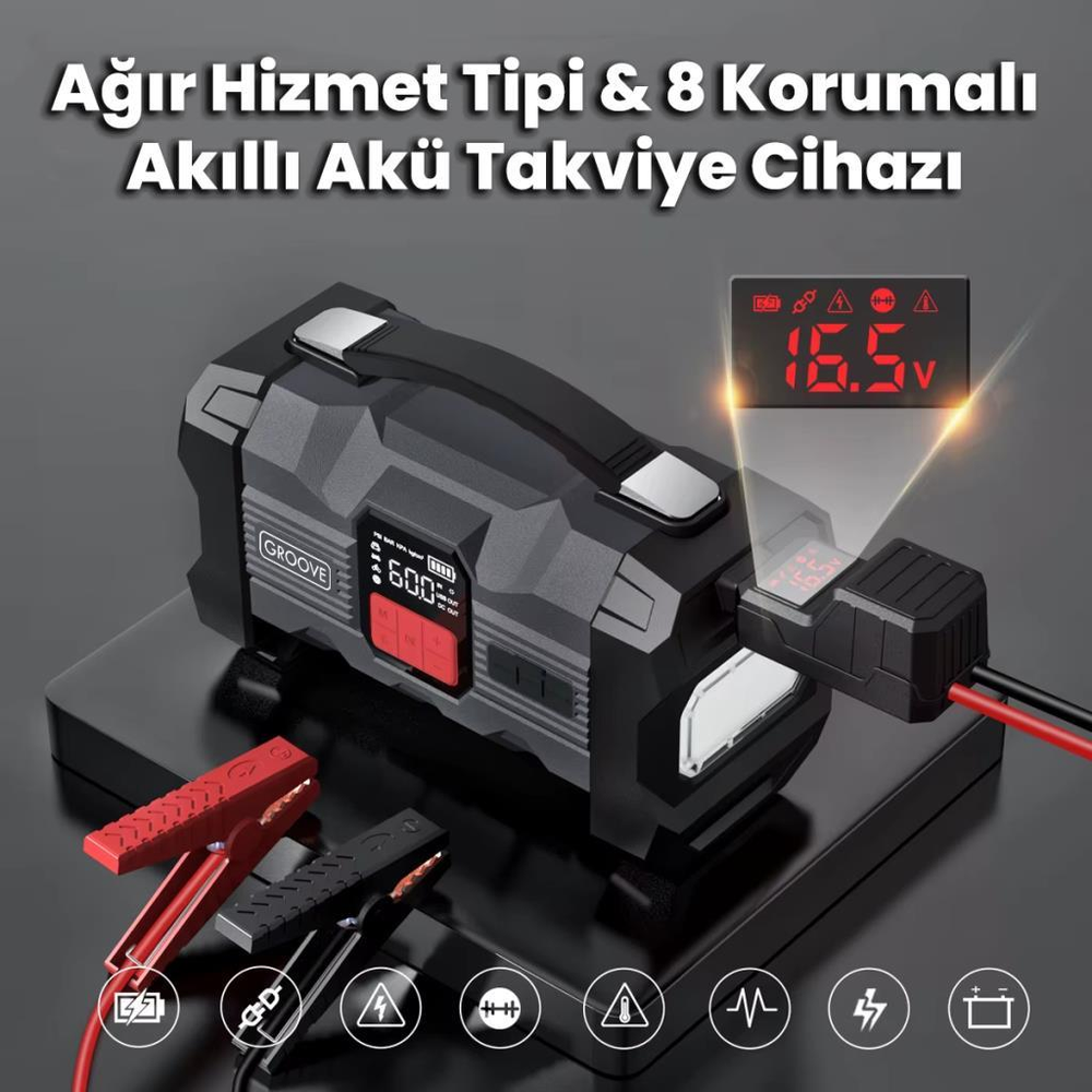 Kırmızı ve siyah kelepçeli siyah akü takviye cihazı. Dijital ekran 16,5 V gösteriyor.