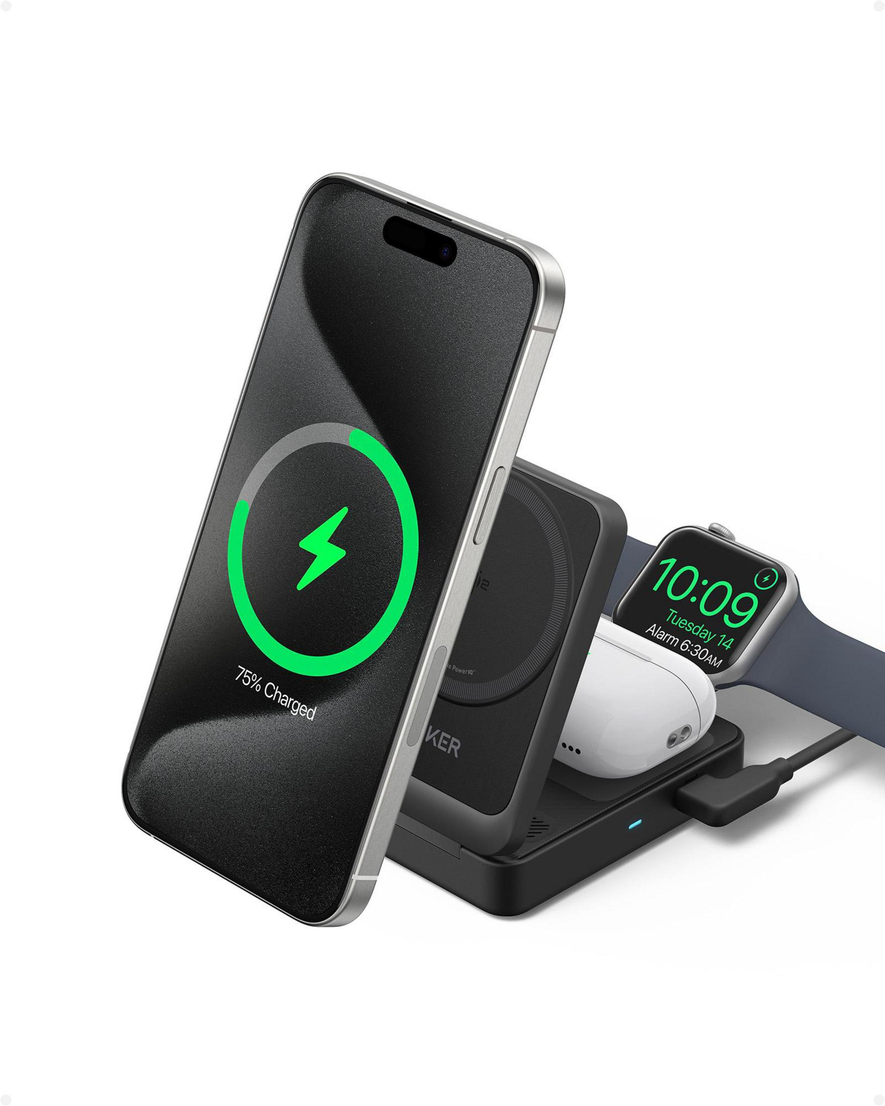 Ein iPhone, Apple Watch, AirPods und Ladegerät auf weißem Hintergrund.