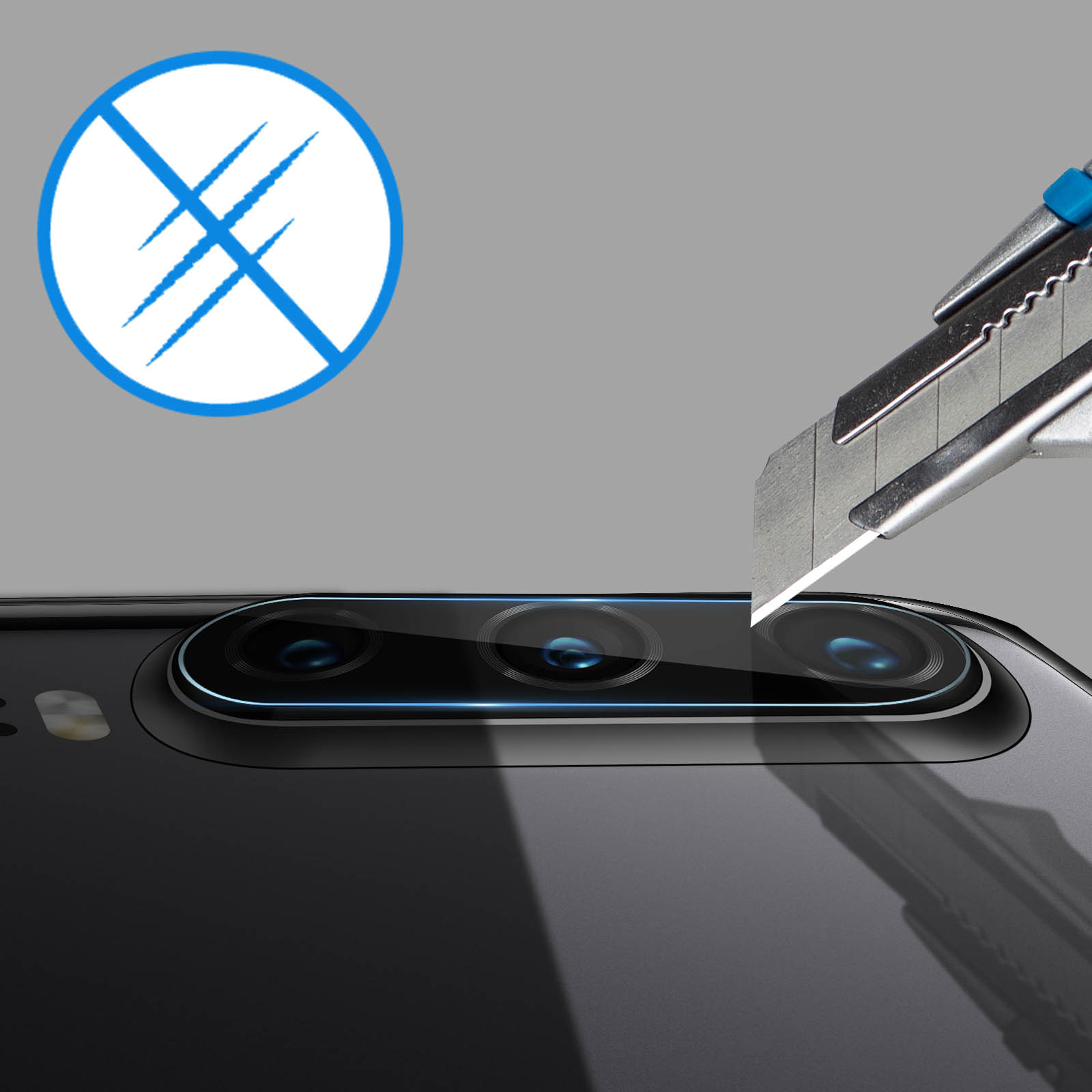 Un cutter s'approche d'un appareil photo de smartphone; un cercle barré signifie interdiction.