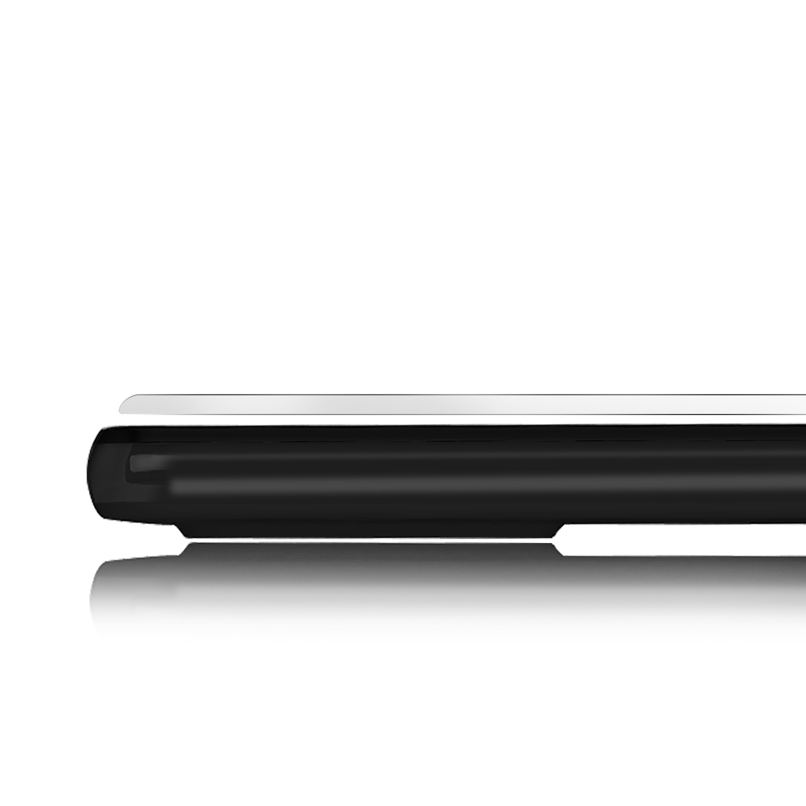 Gros plan d'une forme noire avec une ligne blanche au-dessus, réfléchissant.