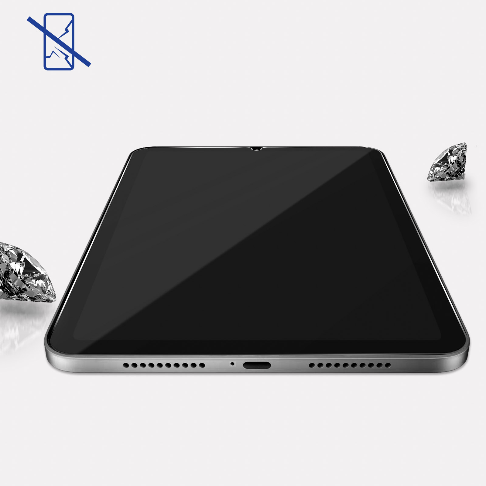 Un tablet con icona blu di vetro rotto e due diamanti.