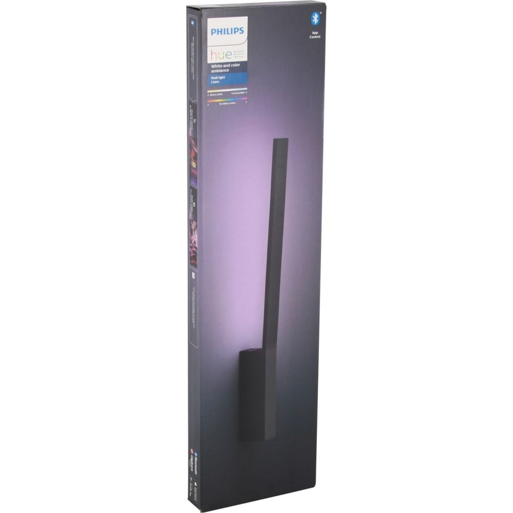 Verpackung für Philips Hue Wandleuchte mit Lichtsäule und Sockel, lila Hintergrund.