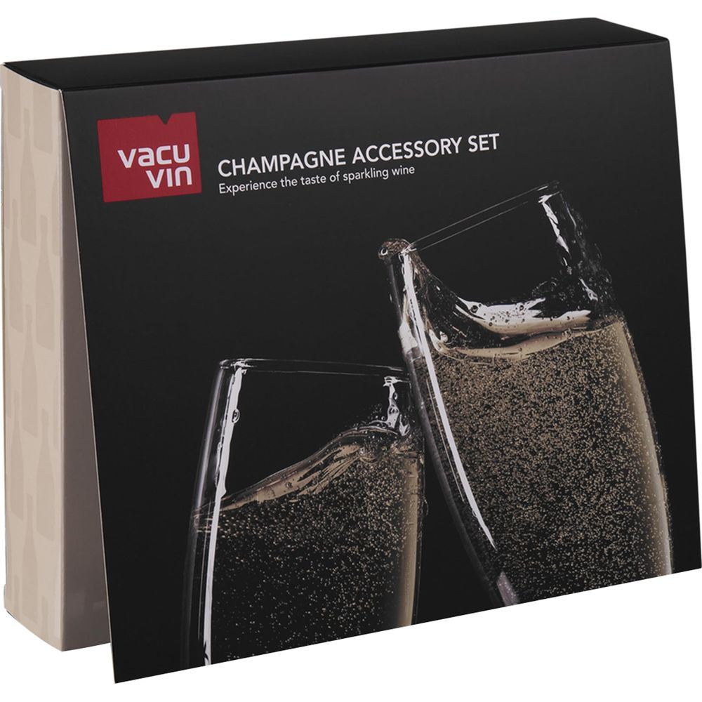 ‘Champagne Accessory Set’ etiketli bir kutu iki kadeh şampanya gösteriyor.